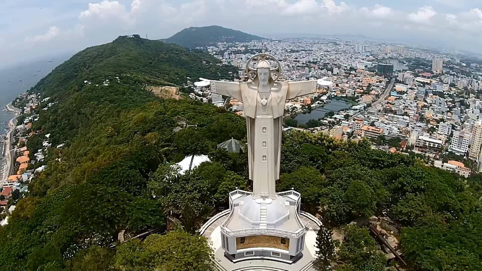 Statue of God with outstretched arms